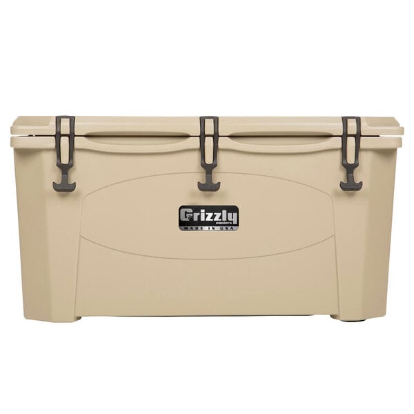 A tan Grizzly Cooler with handles.