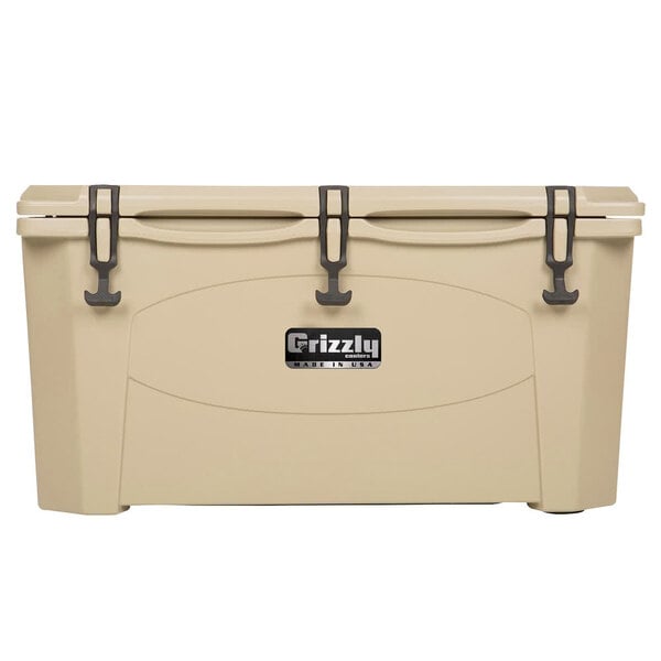 A tan Grizzly Cooler with three handles.