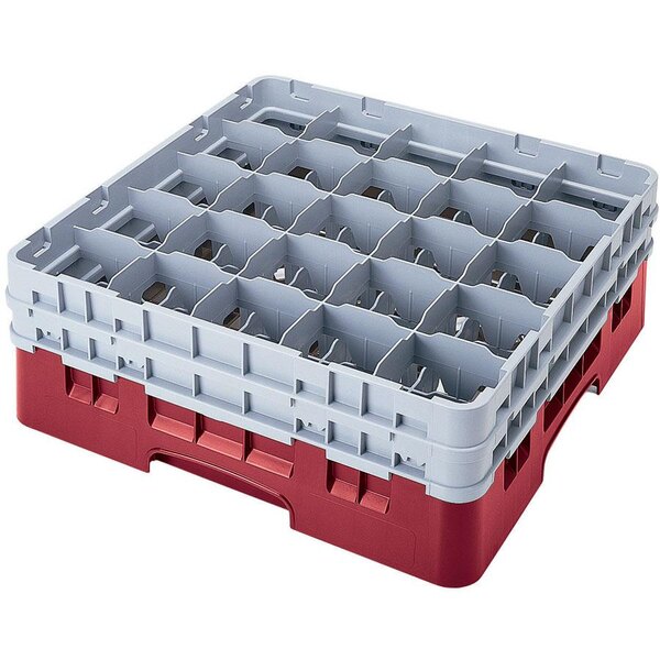 A red and white plastic Cambro glass rack with several compartments and an extender.