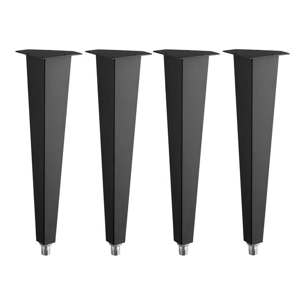 A set of four black metal Vulcan legs.