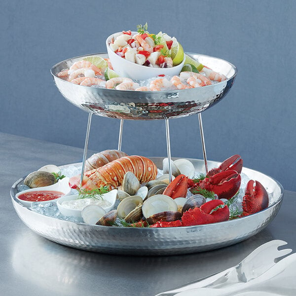 An American Metalcraft stainless steel double wall seafood tray with a lobster and clams on it.