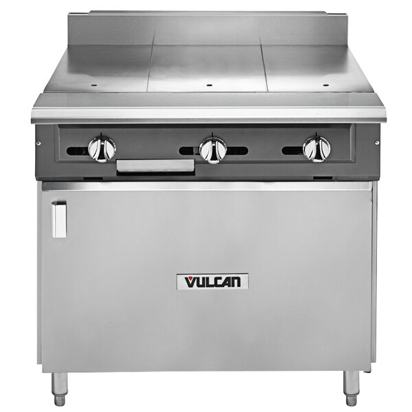 A large stainless steel Vulcan commercial gas range with a hot top and cabinet.