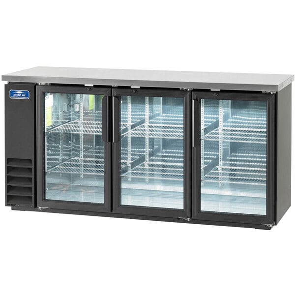 A black refrigerator with glass doors.