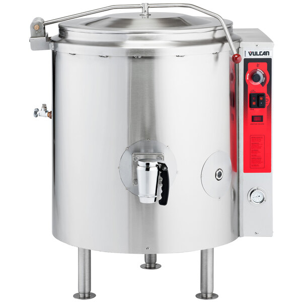 A large stainless steel Vulcan stationary steam kettle with a red lid.