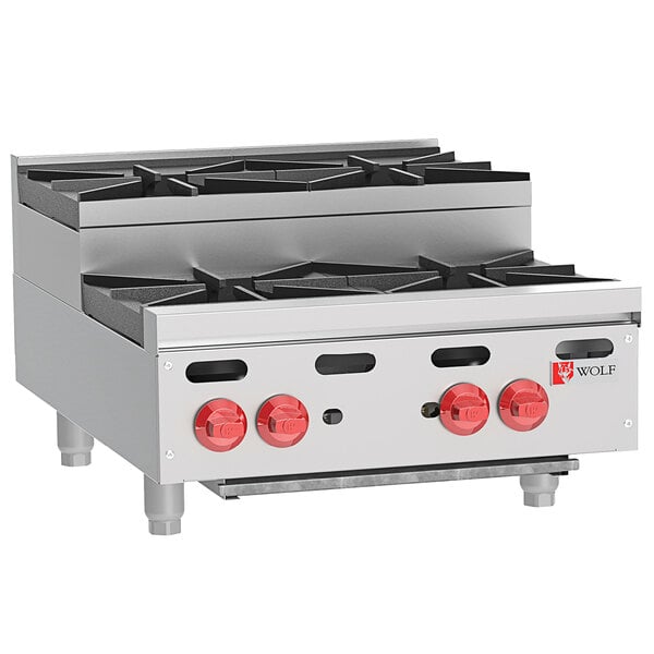 A Wolf stainless steel countertop range with 4 burners.
