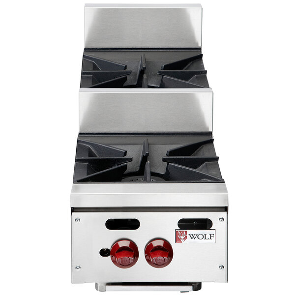 A Wolf Achiever natural gas countertop range with two step-up burners.