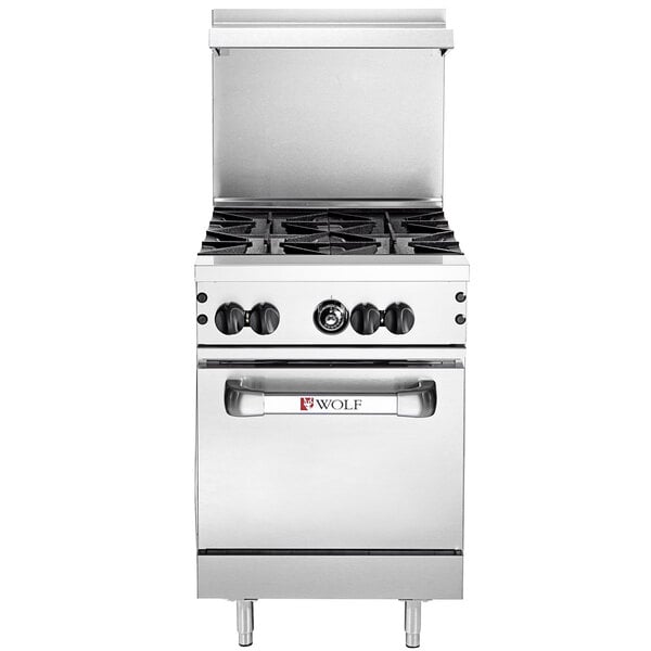 A stainless steel Wolf commercial gas range with 4 burners and a standard oven.
