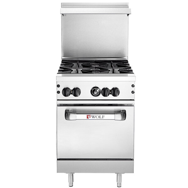 A Wolf stainless steel commercial range with 4 burners and an oven.