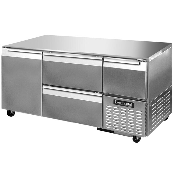 A stainless steel Continental undercounter refrigerator with two drawers and one half door.