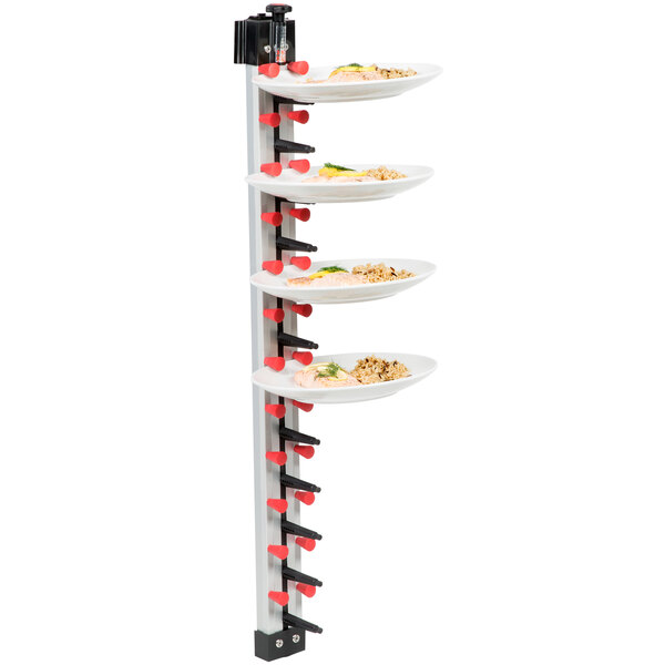 A white Plate Mate wall mount rack holding three plates.