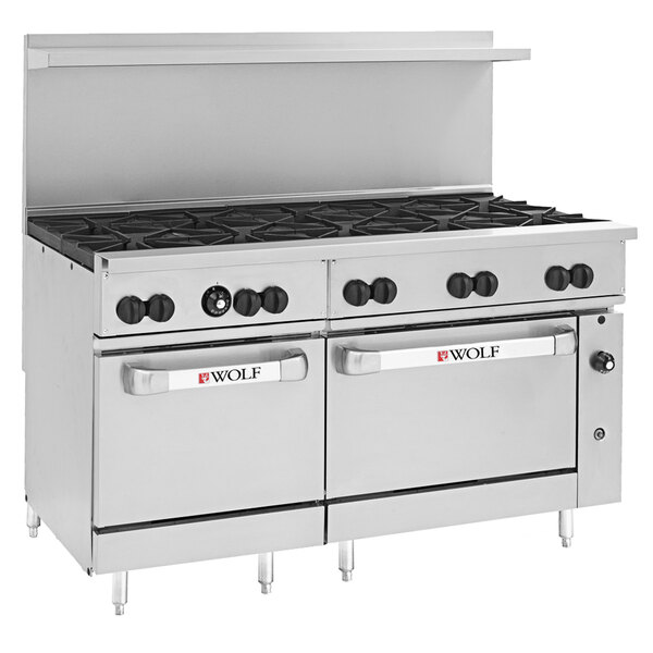 A large stainless steel Wolf commercial range with 10 burners and 2 ovens.