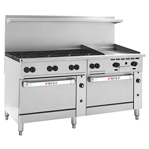 A Wolf stainless steel commercial range with 8 burners, a griddle, and 2 ovens.