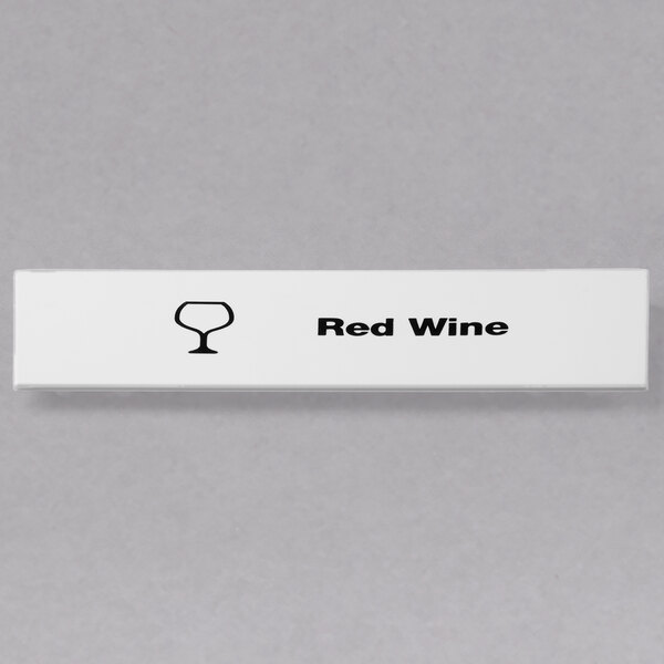 A white rectangular ID clip with the words "Red Wine" on it.