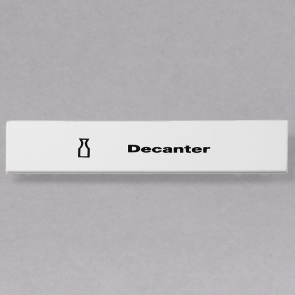 A white rectangular Cambro decanter extender ID clip with black text.