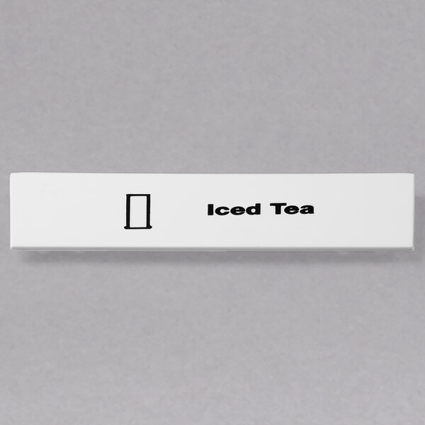 A white rectangular ID clip with black text reading "Iced Tea" on a counter.