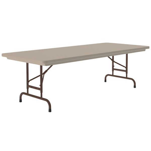A rectangular Correll folding table with a brown metal frame.