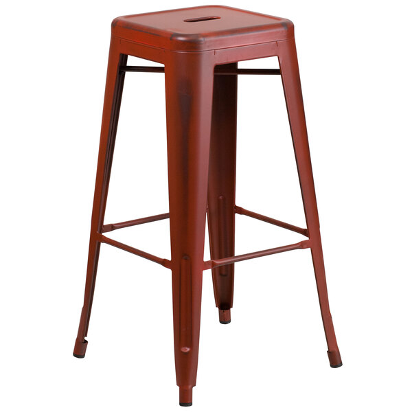 A Flash Furniture red metal bar stool with a square seat.