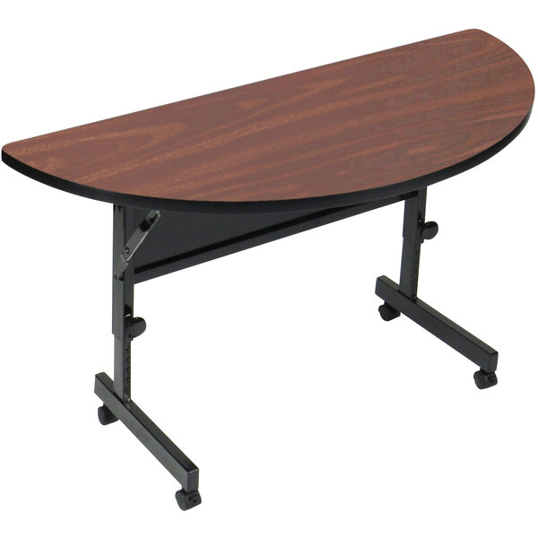 A Correll walnut half round seminar table with a curved top.