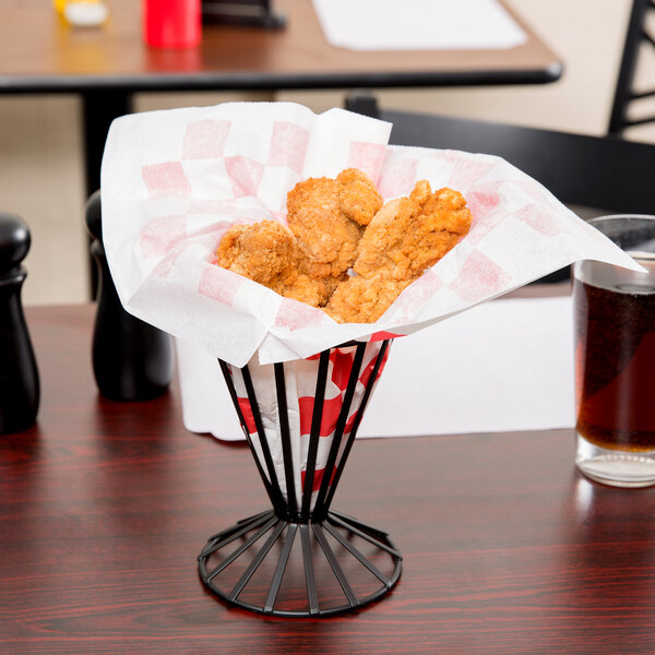 A red check Choice cone basket liner with food inside.