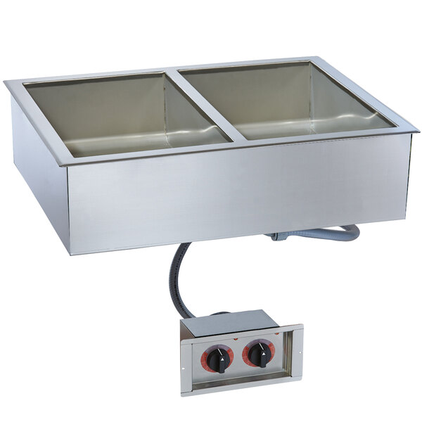 A stainless steel drop-in hot food well with two sections.
