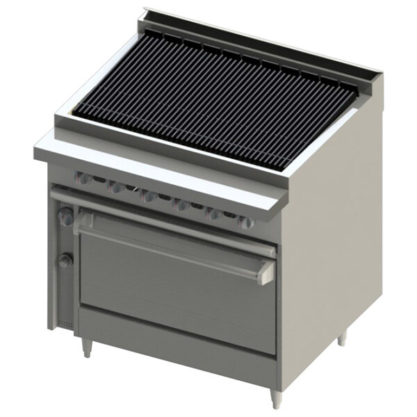 A large white stove with black grills over a black metal grill.