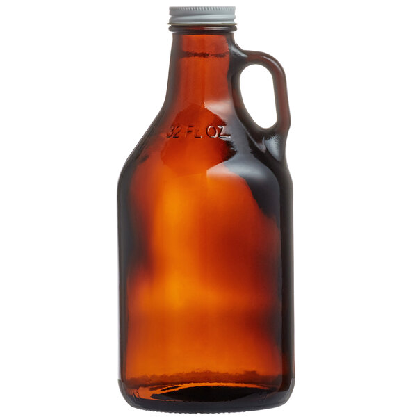 A close-up of a Libbey amber glass growler with a handle.