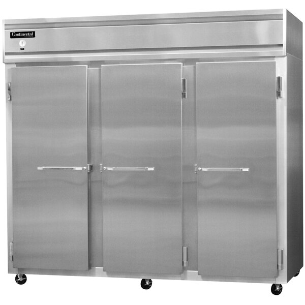 A Continental Refrigerator reach-in freezer with three solid doors on a white surface.