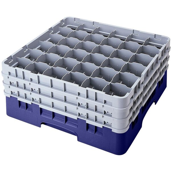 A navy blue plastic Cambro glass rack with 36 compartments and 5 extenders.