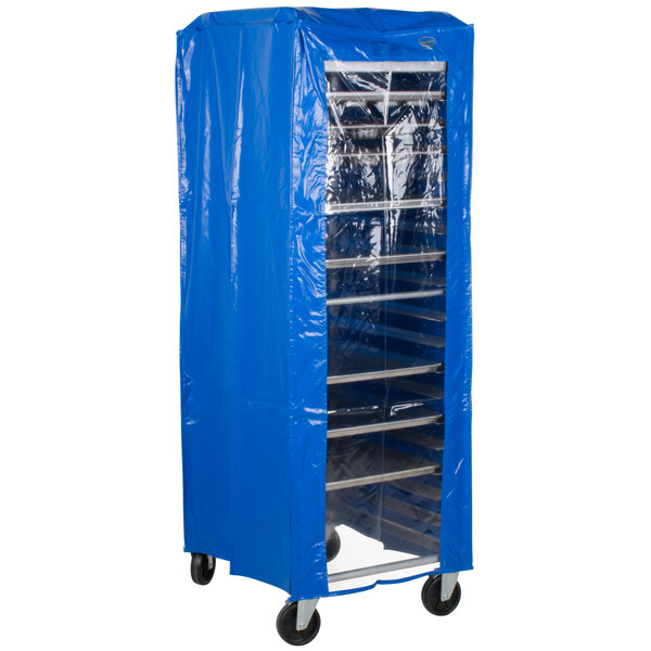 A blue plastic cover for a bun pan rack on a cart.