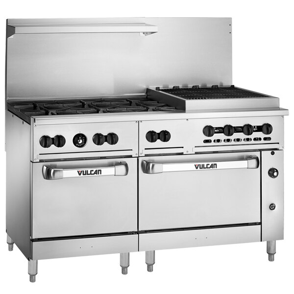 A large stainless steel Vulcan range with 6 burners, a charbroiler, and 2 ovens.