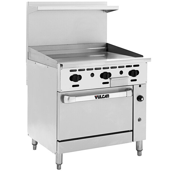A large stainless steel Vulcan commercial gas range with a manual griddle and black knobs.