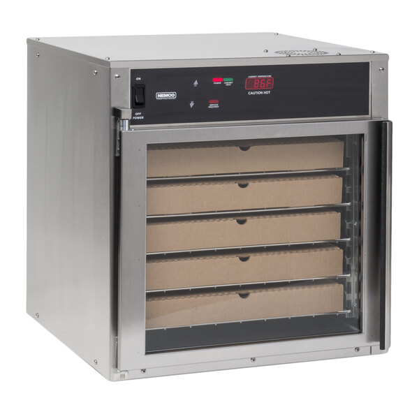 A Nemco countertop pizza holding cabinet with trays inside.