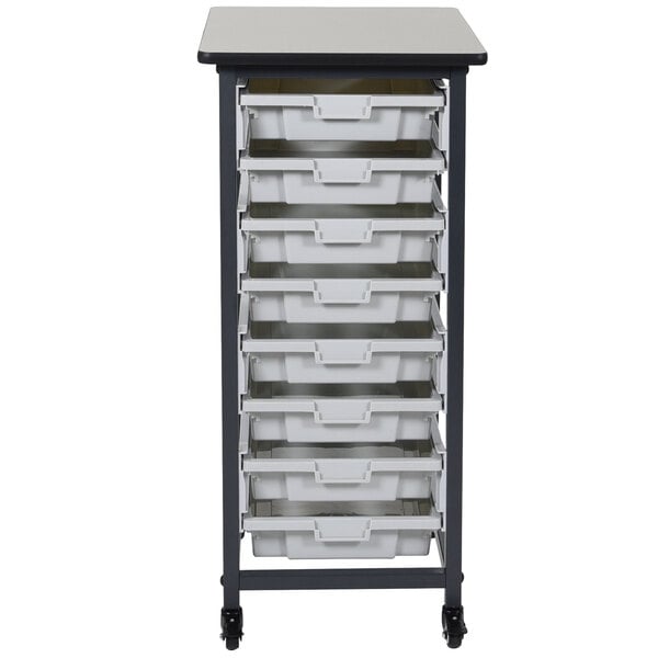 A white and black mobile storage unit with small bins on shelves.