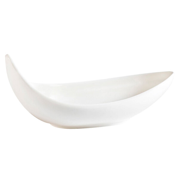 A close-up of a CAC bone white porcelain boat dish on a white background.