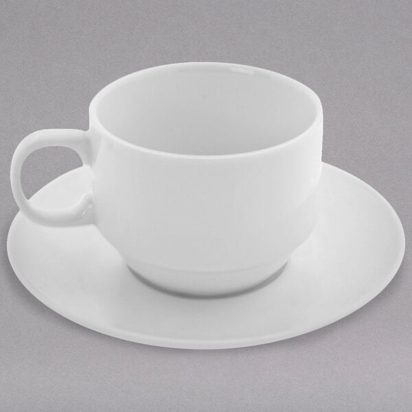 A 10 Strawberry Street Bistro bright white porcelain cup on a saucer.