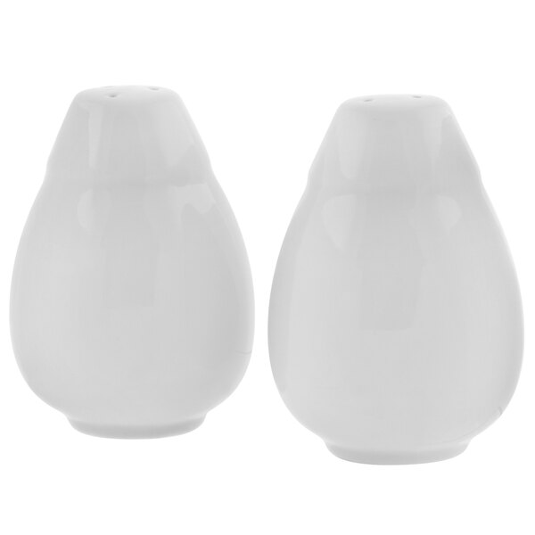 A pair of white 10 Strawberry Street salt and pepper shakers.