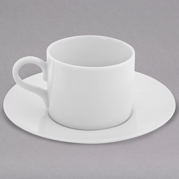 A 10 Strawberry Street Royal White porcelain demi can cup and saucer.