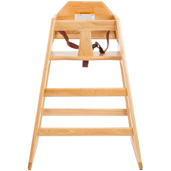 A Tablecraft wooden high chair with a natural finish and strap.