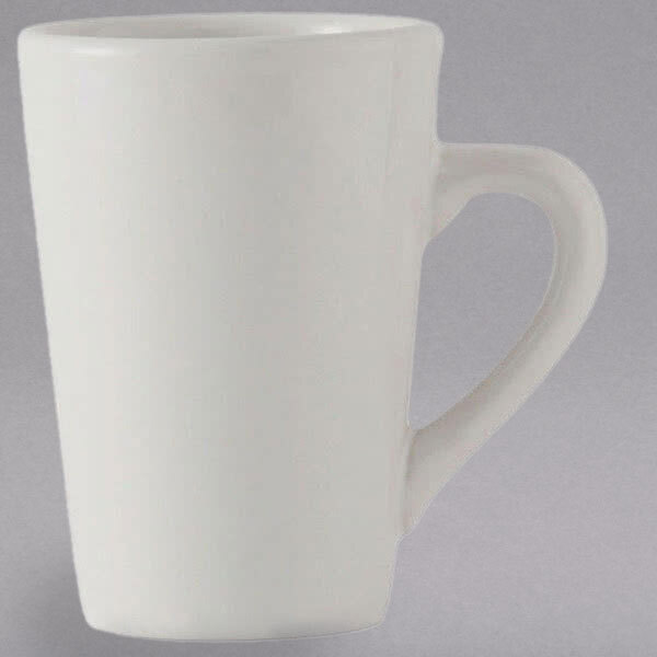 A Tuxton white china mug with a handle.