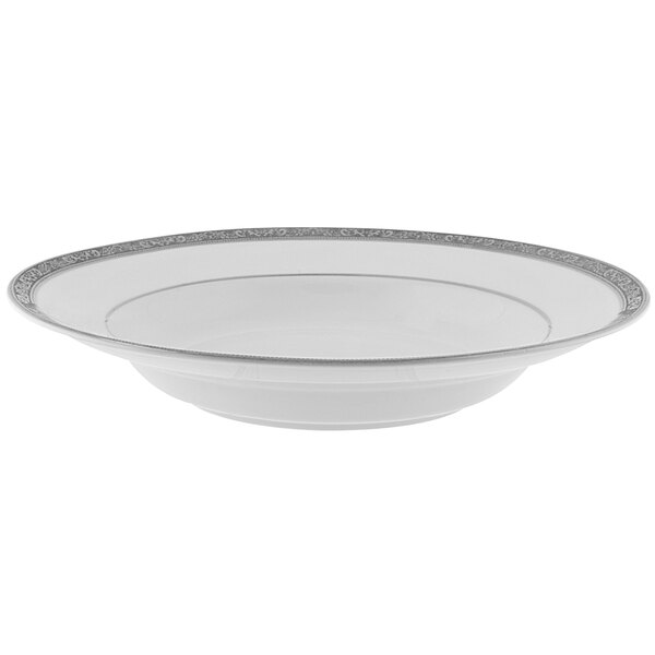 A white bowl with a silver rim.