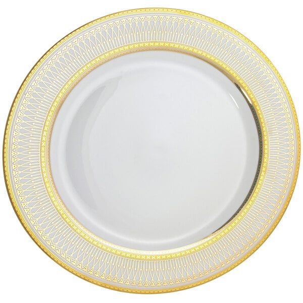 A close up of a white 10 Strawberry Street Iriana porcelain bread and butter plate with gold trim.