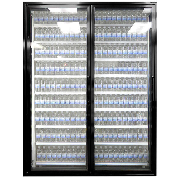 Styleline walk-in cooler doors with glass panels and shelving holding water bottles.
