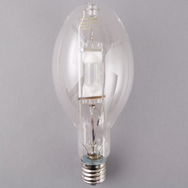 A close-up of a Satco high pressure sodium light bulb with a clear finish.