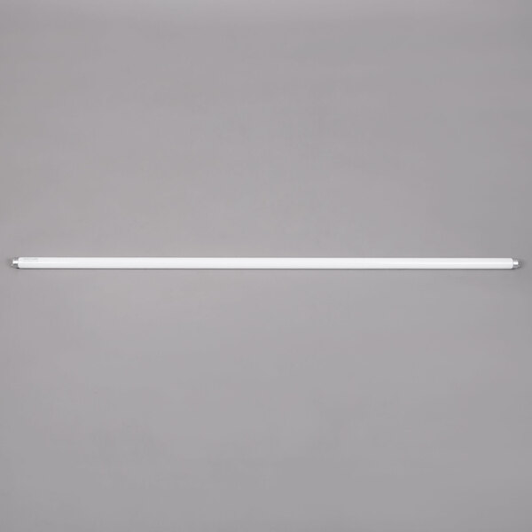 A Satco T8 fluorescent tube with a white light on a gray background.