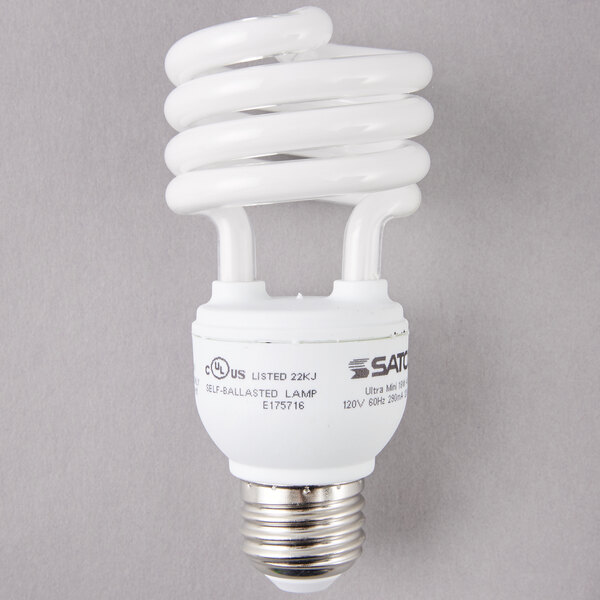 A close-up of a white spiral Satco light bulb.