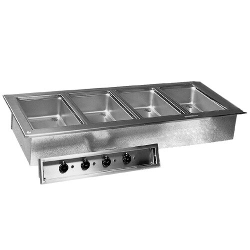 A stainless steel Delfield drop-in hot food well with four compartments.