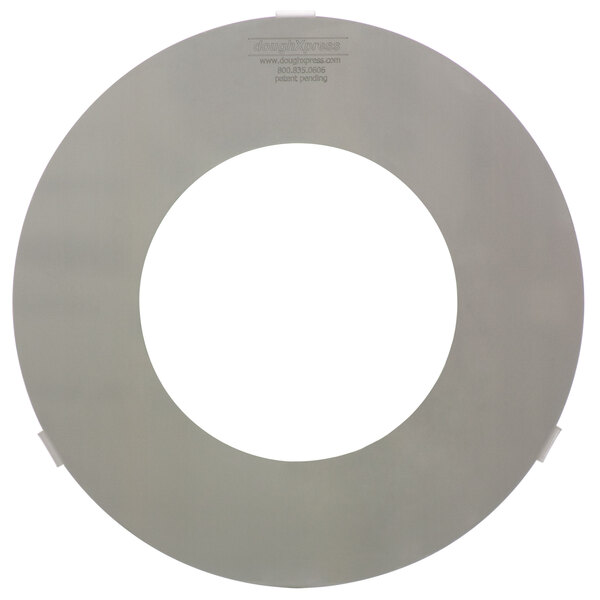 A circular metal plate with a white circle and a black border with a hole in the middle.