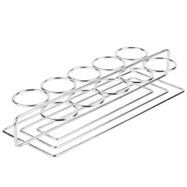 A Clipper Mill stainless steel round compartment rack with circles.