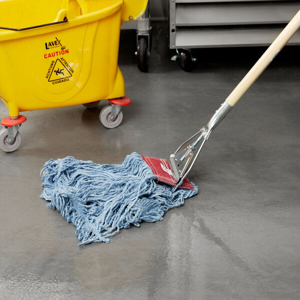 A Rubbermaid blue blend wet mop with a metal structure on a yellow mop bucket with wheels.