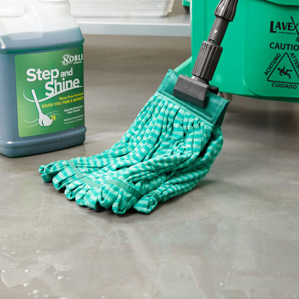 A Rubbermaid green microfiber wet mop head with a green container.